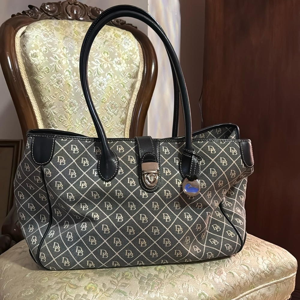 Dooney & Bourke shoulder bag. Black, Cream letters. Vintage.